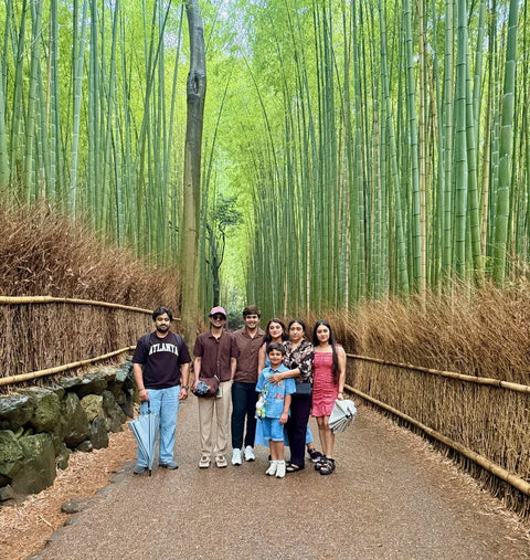 friends in arashiyama bamboo forest in kyoto, japan on a beyond tokyo journey